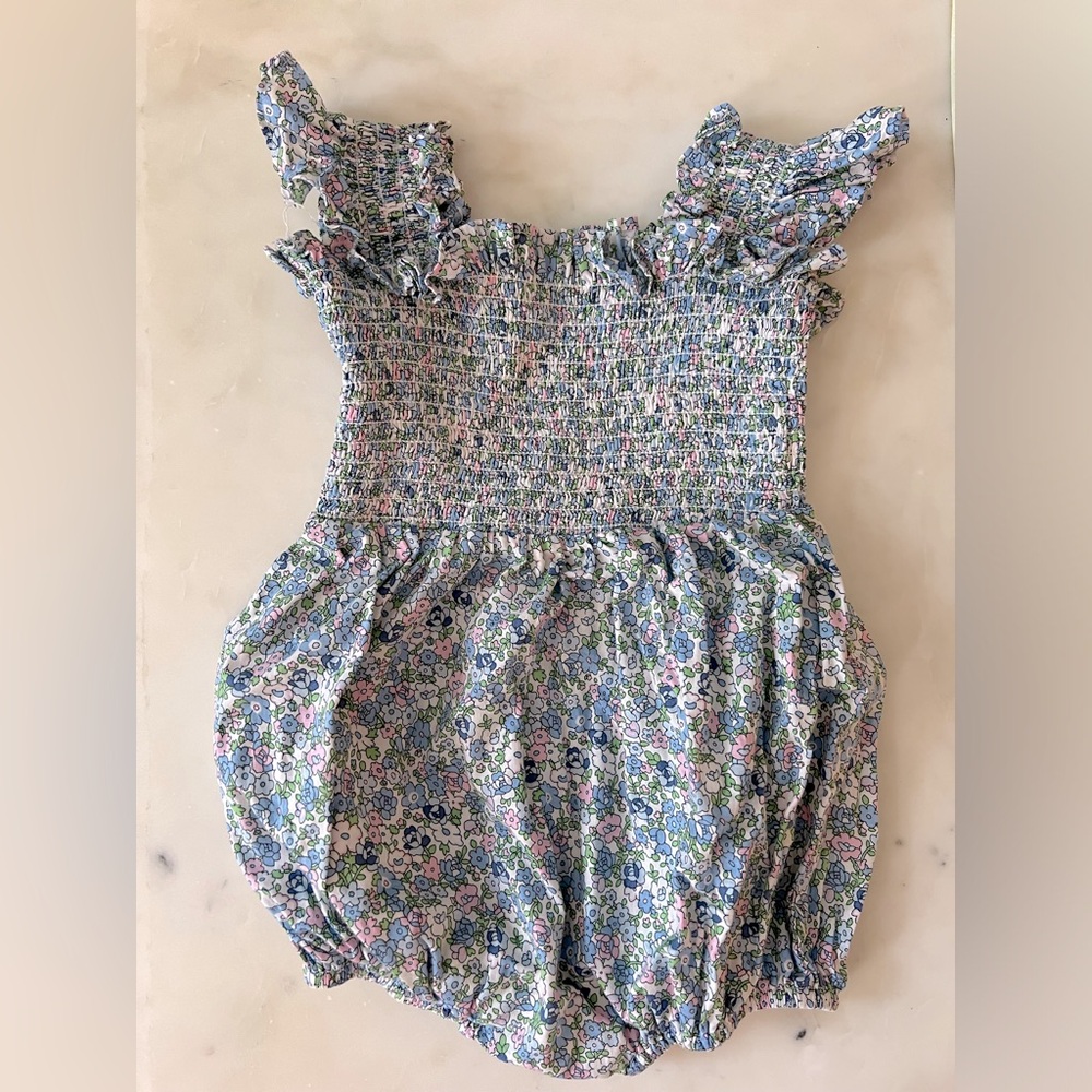 Poppy Kids 2T floral bubble. 100% cotton. Snap closure. Ruffle straps.